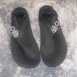 Water socks. Black with letter B at the toe.